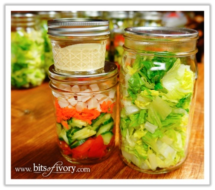 Lettuce, salad toppings, and salad dressing in various canning jars | www.bitsofivory.com