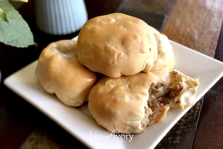 Photo of bierocks which are cabbage and beef stuffed rolls.